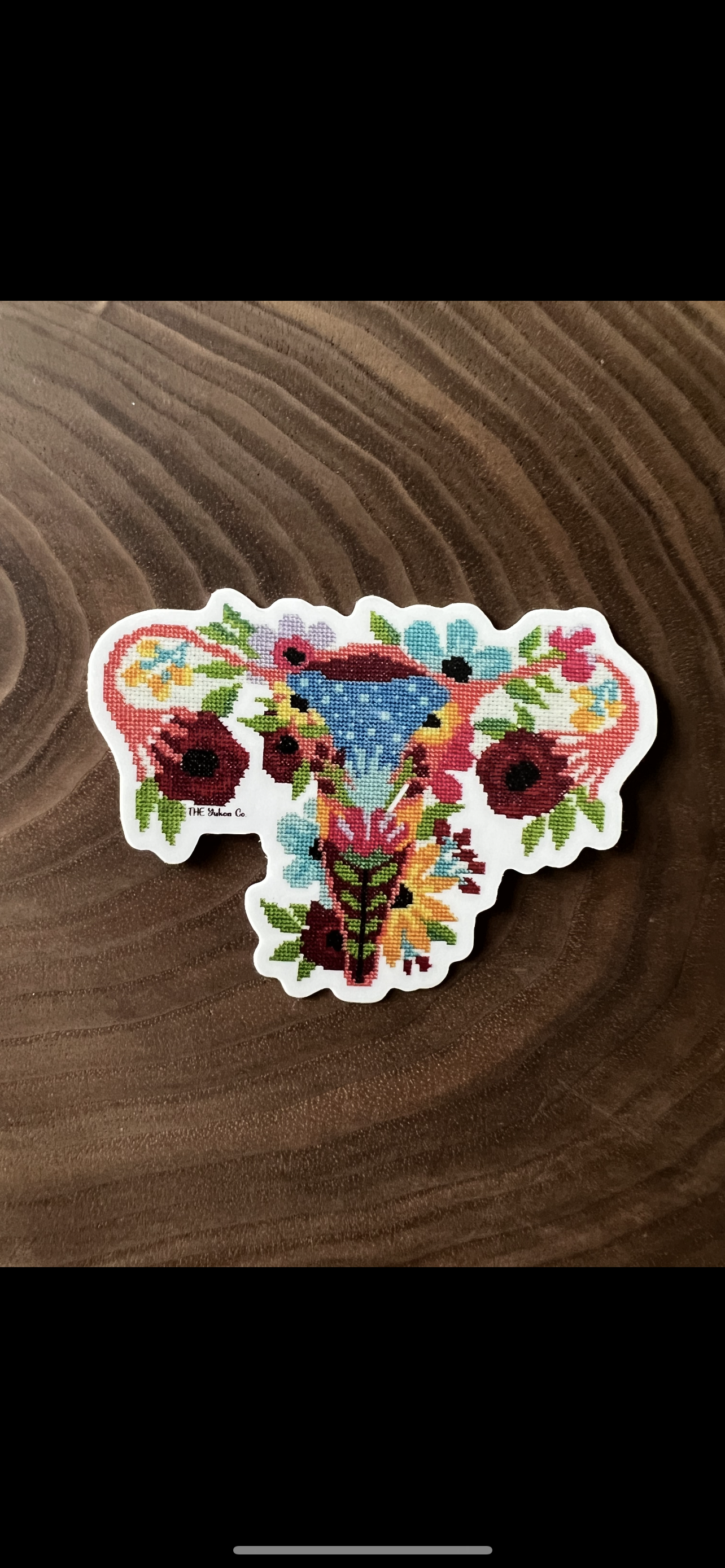 Cross stitched floral uterus